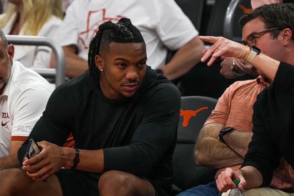 Texas ex Bijan Robinson, seen watching the Texas men's basketball team's home loss to Houston on Jan. 29, totaled nearly 1,500 yards of offense as a rookie running back with the Atlanta Falcons in 2023.