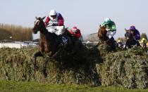 Britain Horse Racing - Grand National Festival - Aintree Racecourse - 8/4/17 Derek Fox on One For Arthur in action during the 5:15 Randox Health Grand National Reuters / Phil Noble Livepic