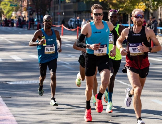 Nathan Martin, at left, is the fastest U.S.-born Black marathoner, having beaten Herm Atkins's 1979 record time.<p>New York Road Runners</p>