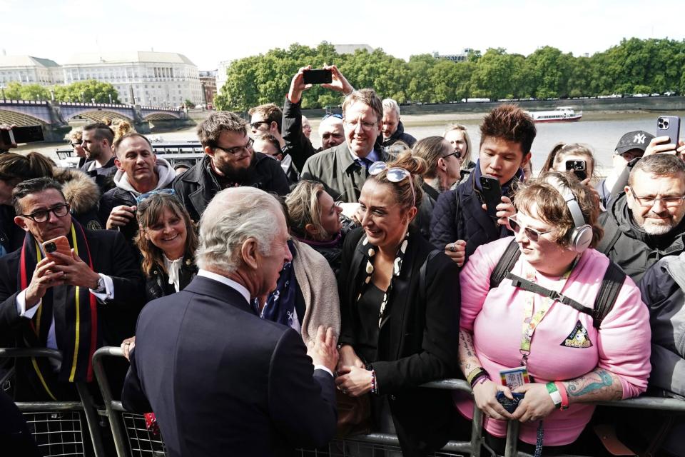King Charles III meets members of the public in the queue along the South Bank, near to Lambeth Bridge, London, as they wait to view Queen Elizabeth II lying in state ahead of her funeral on Monday. Picture date: Saturday September 17, 2022. (Photo by Aaron Chown/PA Images via Getty Images)