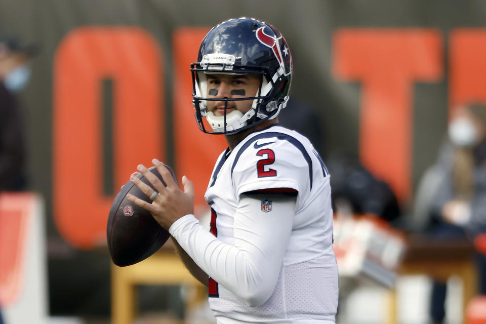 FILE - Houston Texans quarterback AJ McCarron (2) warms up prior to the start of an NFL football game against the Cleveland Browns, Sunday, Nov. 15, 2020, in Cleveland. While they await a ruling on Deshaun Watson, the Cleveland Browns are working out quarterbacks this week to make sure they're prepared for training camp. A.J. McCarron and Josh Rosen, two QBs who have been on Cleveland's radar previously, are among the quarterbacks getting a look, said a person familiar with the team's plans on Thursday, July 21, 2022. (AP Photo/Kirk Irwin, File)