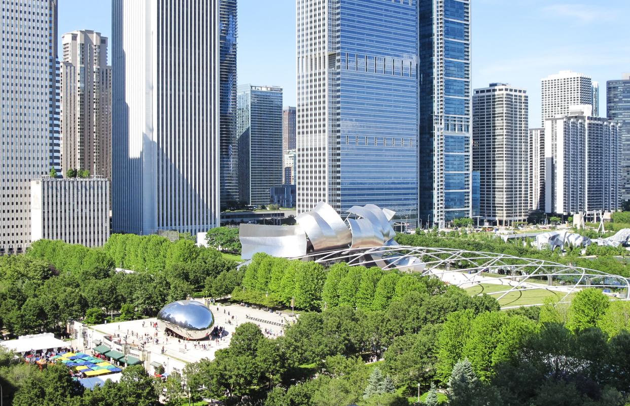 Cloud Gate, known affectionately as The Bean, is centerpiece of Millennium Park in Chicago, IL. Also shown is the Pritzker Pavilion. This view is from the University Club in Chicago's Loop area.