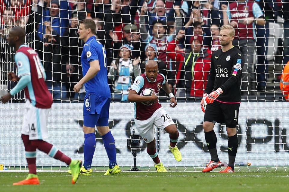 <p>Britain Football Soccer – West Ham United v Leicester City – Premier League – London Stadium – 18/3/17 West Ham United’s Andre Ayew grabs the ball after Manuel Lanzini scores their first goal Reuters / Peter Nicholls Livepic EDITORIAL USE ONLY. No use with unauthorized audio, video, data, fixture lists, club/league logos or “live” services. Online in-match use limited to 45 images, no video emulation. No use in betting, games or single club/league/player publications. Please contact your account representative for further details. </p>