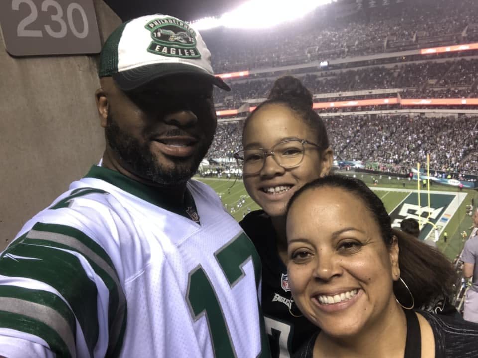 Koroun Butler, with his daughter, Naomi, and wife, Danielle, at a Philadelphia Eagles game. (Photo: Koroun Butler)