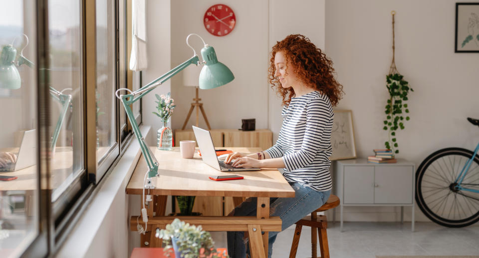 A woman working from home (WFH)