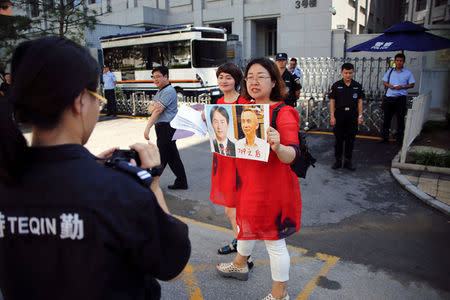 Wang Qiaoling, the wife of lawyer Li Heping, takes a part in protest with other relatives of those detained in what is known as the "709" crackdown, in front of the Supreme People's Procuratorate in Beijing, China July 7, 2017. REUTERS/Damir Sagolj