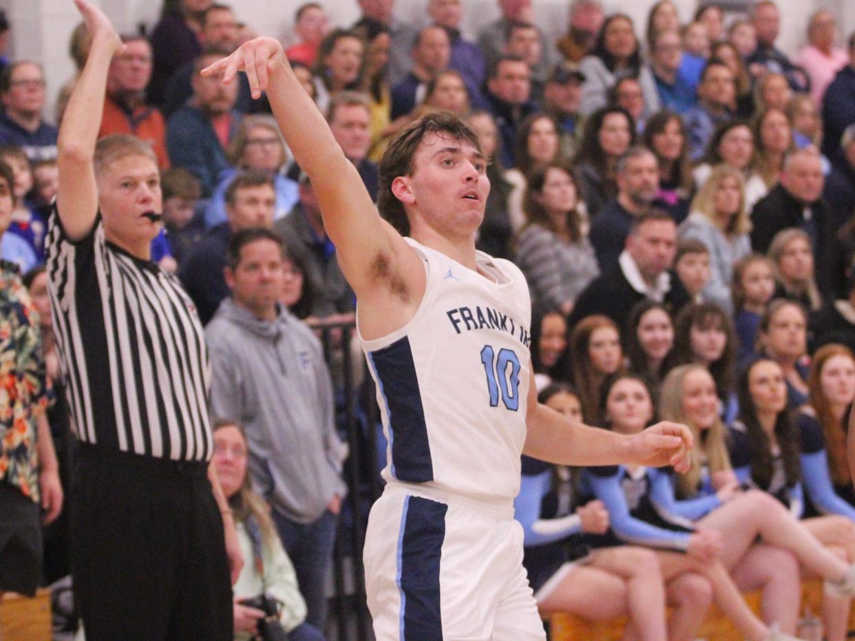 Franklin's Henry DiGiorgio sinks a three pointer during a Division 1 Round of 16 game against Putnam Vo-Tech.