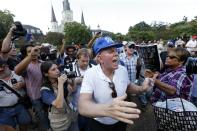 <p>Former Ku Klux Klan leader and current Senate candidate David Duke tries to speak as he is taunted by hecklers, prior to a protest organized by Take ’Em Down NOLA, Sept. 24, 2016. (Photo: Gerald Herbert/AP) </p>