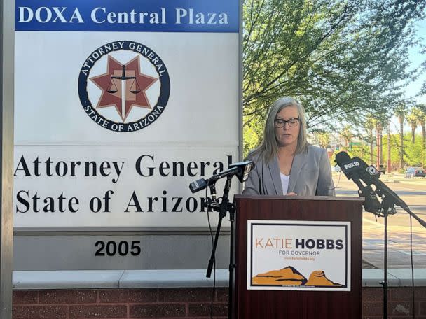 PHOTO: Arizona secretary of state and Democratic nominee for governor, Katie Hobbs, reacts to a judge ruling that a near-total abortion ban must be enforced in Arizona, outside the Attorney General's office in Phoenix, on Sept. 24, 2022. (Libby Cathey/ABC News)