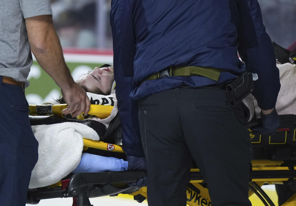 Kamloops Blazers' Kyle Masters is taken off the ice on a stretcher after a collision with Peterborough Petes' Chase Stillman during third-period CHL Memorial Cup hockey game action in Kamloops, British Columbia, Sunday, May 28, 2023. (Darryl Dyck/The Canadian Press via AP)
