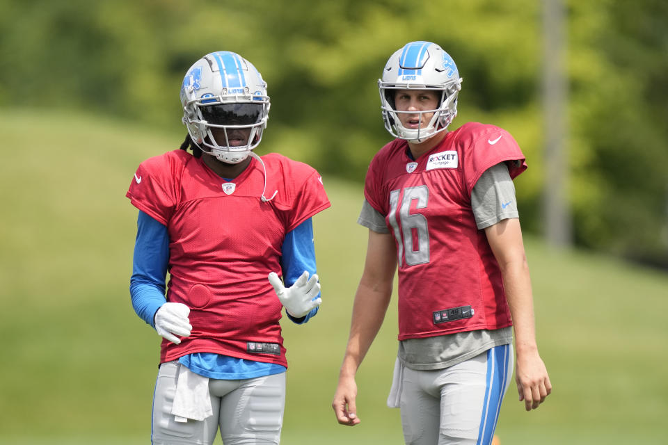 Detroit Lions quarterback Teddy Bridgewater, left, stands next to quarterback Jared Goff during an NFL football practice, Monday, Aug. 14, 2023, in Allen Park, Mich. (AP Photo/Carlos Osorio)