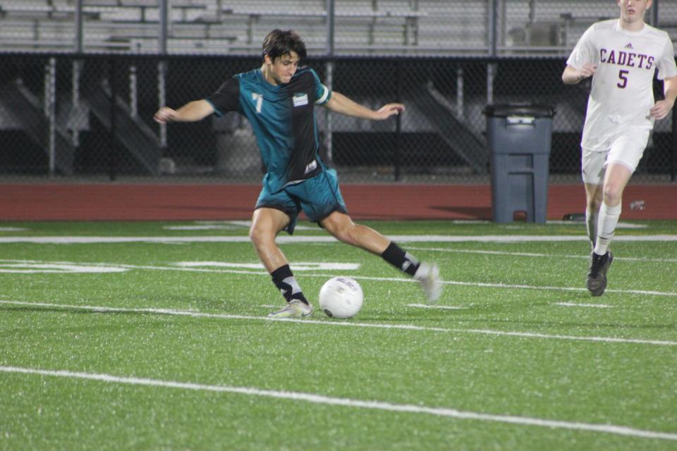 Islands senior Caleb Swenson in action in a win over Benedictine Thursday.