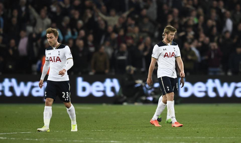 Christian Eriksen and Eric Dier look dejected