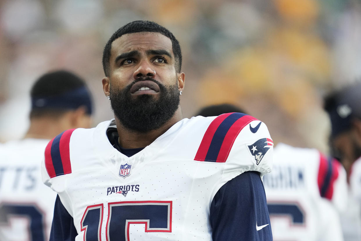 GREEN BAY, WISCONSIN - AUGUST 19: Ezekiel Elliott #15 of the New England Patriots looks on before the start of a preseason game against the Green Bay Packers at Lambeau Field on August 19, 2023 in Green Bay, Wisconsin. (Photo by Patrick McDermott/Getty Images)