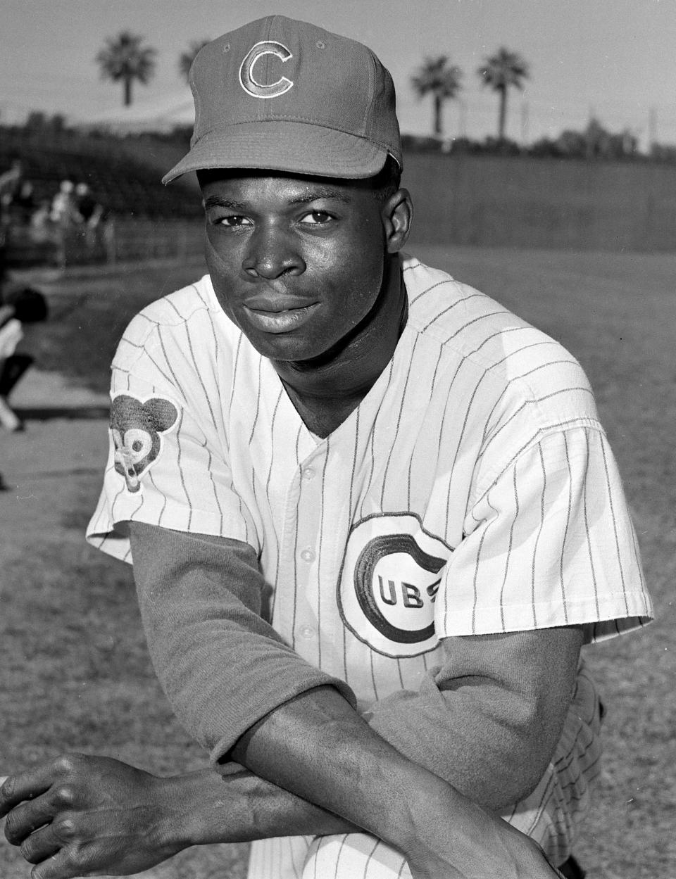 FILE - In this March 8, 1963, file photo, Lou Brock, outfielder of the Chicago Cubs, poses at the team's spring training camp in Los Angeles. Hall of Famer Brock, one of baseball’s signature leadoff hitters and base stealers who helped the St. Louis Cardinals win three pennants and two World Series titles in the 1960s, has died. He was 81. (AP Photo/Harold Filan, File)