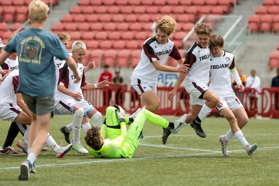 Morgan players celebrates after beating Ogden in penalty kicks in a 3A boys soccer state semifinal at Zions Bank Stadium in Herriman on Wednesday, May 10, 2023. | Spenser Heaps, Deseret News