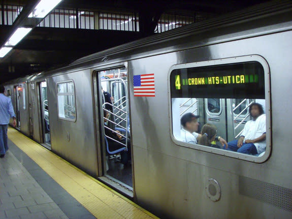 The 4 train inside a New York City subway station.