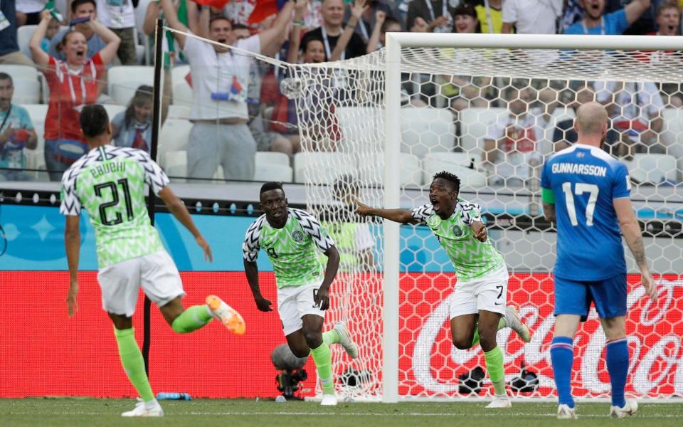 Ahmed Musa celebrates scoring the first of his two goals - AP