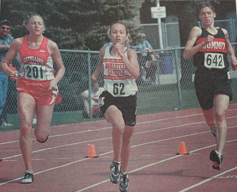 Estelline's Jenni Ching, Bonesteel-Fairfax's Valerie Warnke and Summit's Melinda Zirbel compete in the Class B girls' 800-meter run during the 2002 South Dakota State Track and FIeld Championships at Sioux Falls. Ching won the race for the second-straight year.