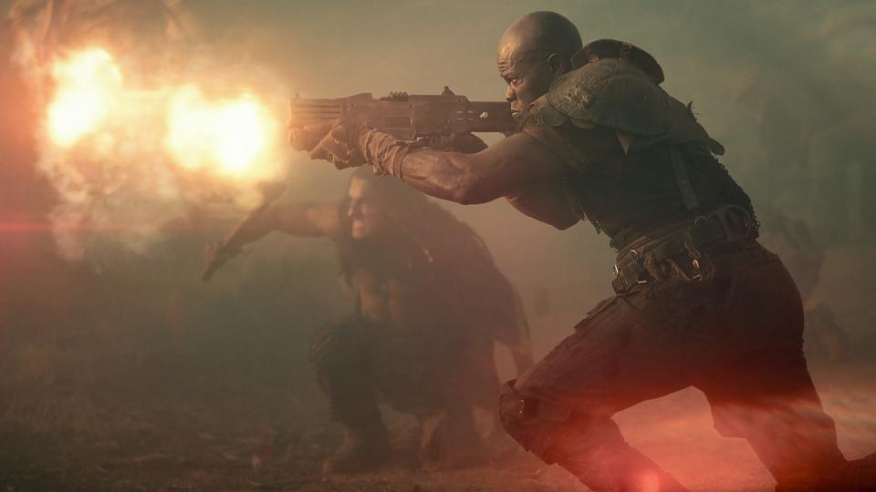 General Titus (Djimon Hounsou) and Tarak (Staz Nair) mid-battle in Rebel Moon — Part Two: The Scargiver