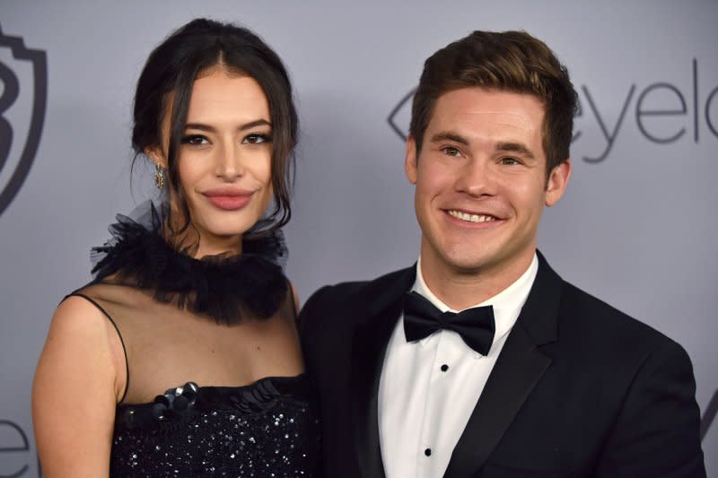 Adam DeVine (R) and Chloe Bridges attend the InStyle and Warner Bros. Golden Globes after-party in 2018. File Photo by Christine Chew/UPI