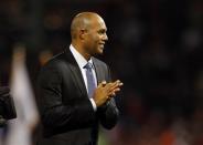 Oct 24, 2013; Boston, MA, USA; New York Yankees former pitcher Mariano Rivera walks onto the field prior to game two of the MLB baseball World Series between the Boston Red Sox and the St. Louis Cardinals at Fenway Park. Mandatory Credit: Greg M. Cooper-USA TODAY Sports