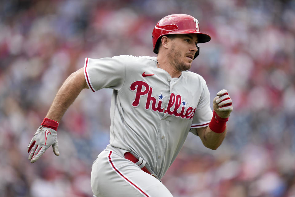 Philadelphia Phillies' J.T. Realmuto doubles in the second inning of a baseball game against the Washington Nationals, Saturday, June 3, 2023, in Washington. (AP Photo/Patrick Semansky)