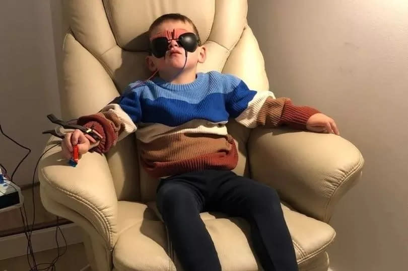 Reggie Aslin, 7, underwent a course of pioneering treatment to improve his vision after suffering multiple strokes -Credit:Submitted Image