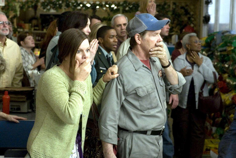 Town people looking shocked in The mist