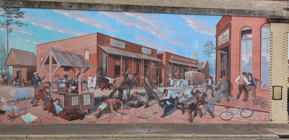 Mural depicting the Dothan Riot of 1889, a bloody battle over taxation, on South St. Andrews St., downtown Dothan.