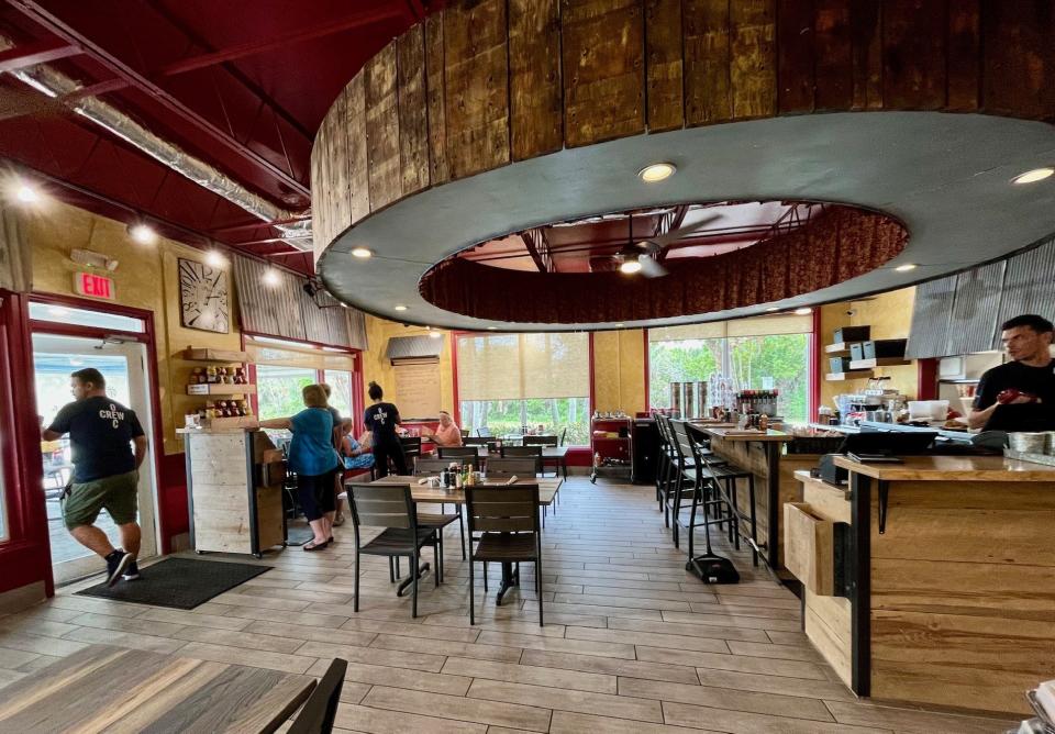 The redone dining room at Over Easy Cafe has the same look and feel as it did before Hurricane Ian hit.