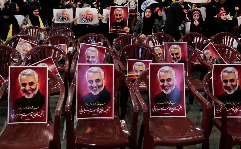 A portrait of late Qassem Soleimani, head of the elite Quds Force, is seen on chairs during a funeral ceremony rally to mourn over his death, in Beirut's suburbs