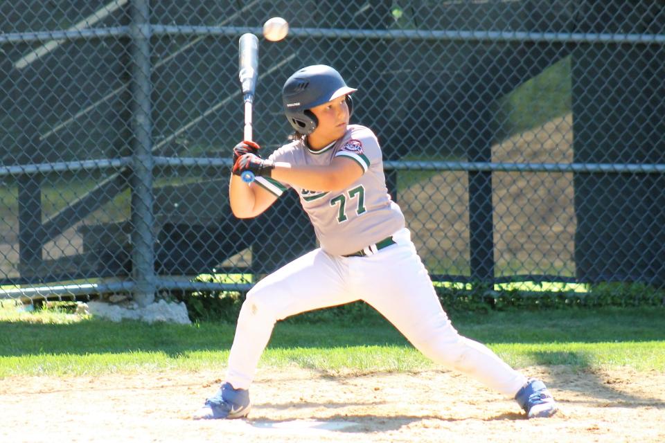 Dover's Oscar Kinnicutt ducks under a high pitch during Saturday morning's Cal Ripken 11-year-old, 60-foot championship game in Dover.