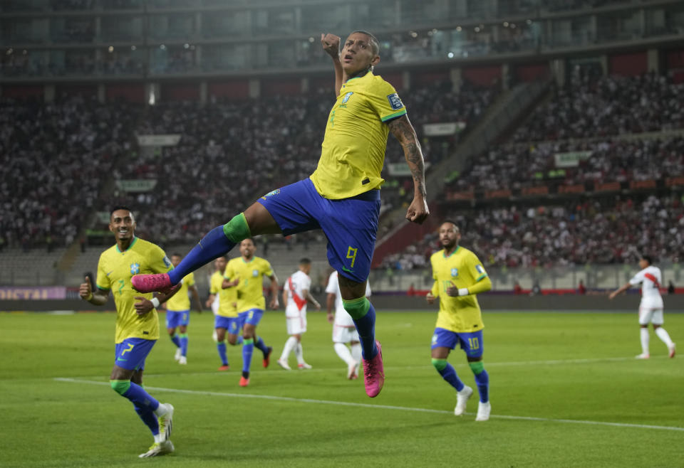 Brazil's Richarlison celebrates scoring his side's opening goal that was later disallowed by the referee during a qualifying soccer match for the FIFA World Cup 2026 against Peru at National stadium in Lima, Peru, Tuesday, Sept. 12, 2023. (AP Photo/Martin Mejia)