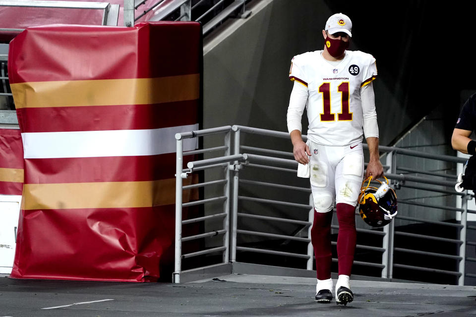 Alex Smith walks out of locker room. 