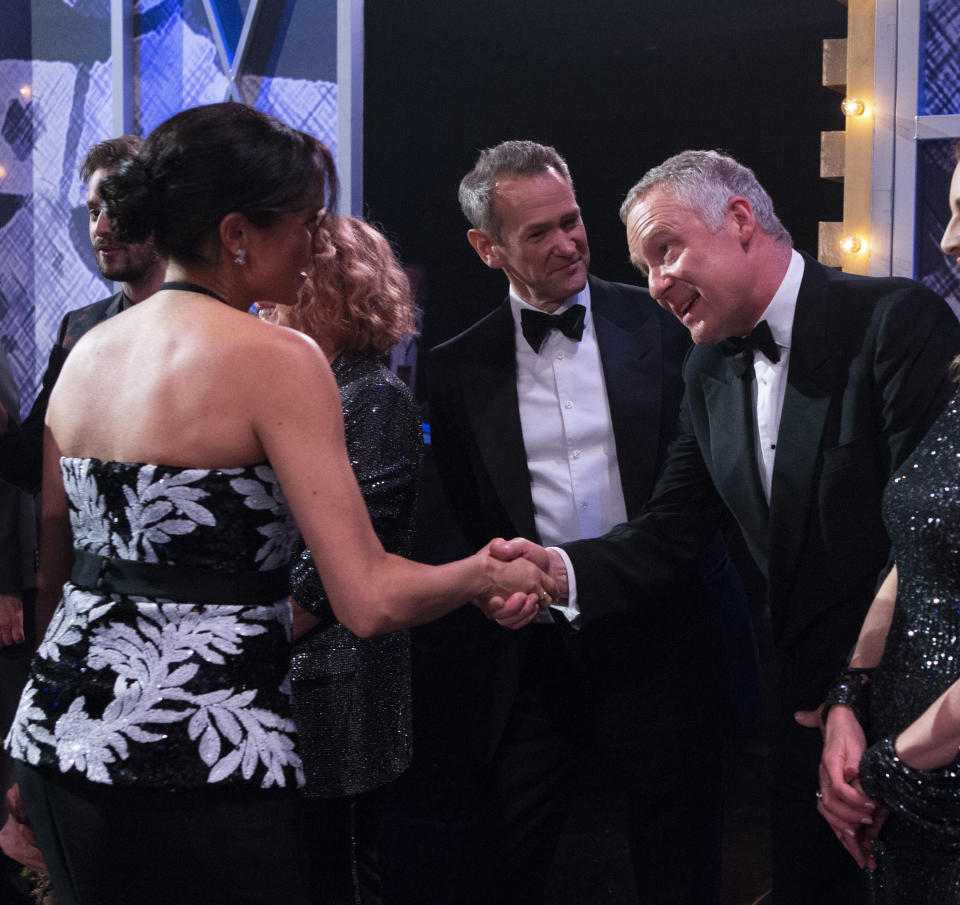 The Duchess of Sussex meets Rory Bremner on stage at the Royal Variety Performance at the London Palladium in central London.