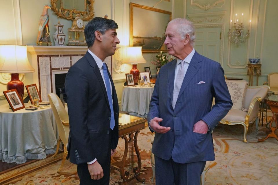 The King speaks with Rishi Sunak at Buckingham Palace (Jonathan Brady/PA Wire)