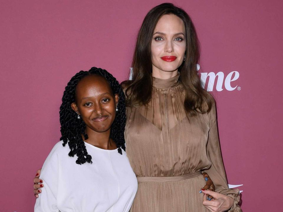 <p>Jon Kopaloff/WireImage</p> Zahara Jolie-Pitt and Angelina Jolie attend Variety