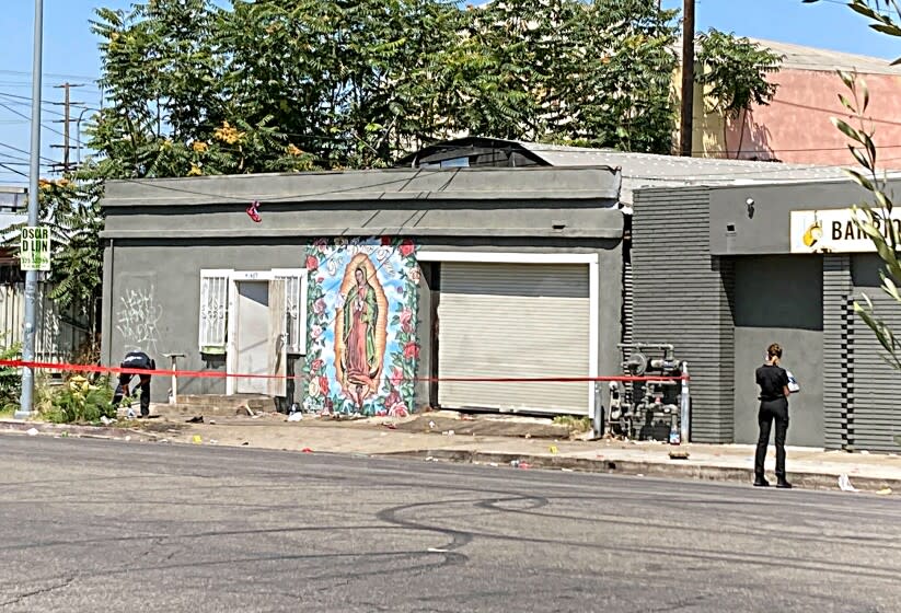 Police tape around the shooting scene in Boyle Heights, 1465 Lorena Street,