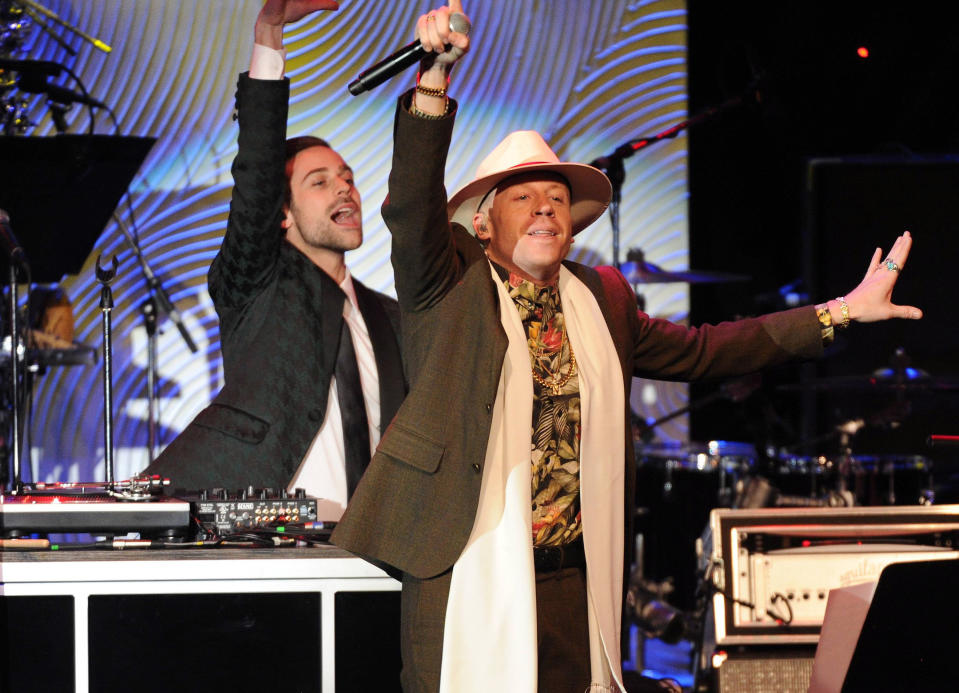 Recording artist Macklemore performs onstage at The 56th Annual GRAMMY Awards Salute to Industry Icons with Clive Davis, on Saturday, Jan. 25, 2014 at the Beverly Hilton Hotel in Beverly Hills, Calif. (Photo by Frank Micelotta/Invision/AP)