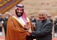 Saudi Arabia's Crown Prince Mohammed bin Salman shakes hands with India's President Ram Nath Kovind during his ceremonial reception at the forecourt of Rashtrapati Bhavan in New Delhi, India, February 20, 2019. REUTERS/Adnan Abidi