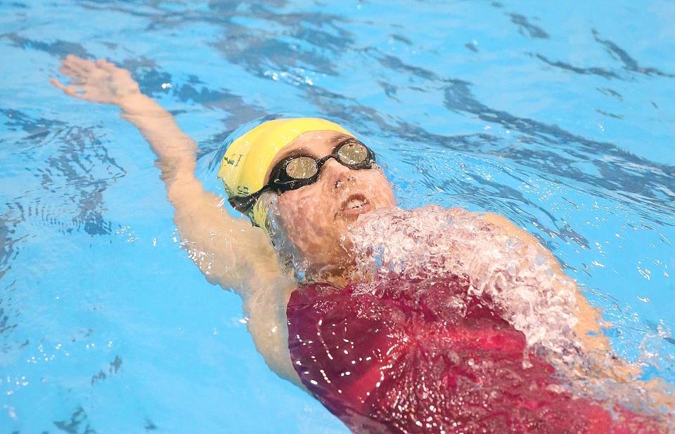 Firestone's Tera Brilmyer swims the backstroke during the 200-yard IM in the Division I district meet, Saturday, Feb. 18, 2023 at Cleveland State.