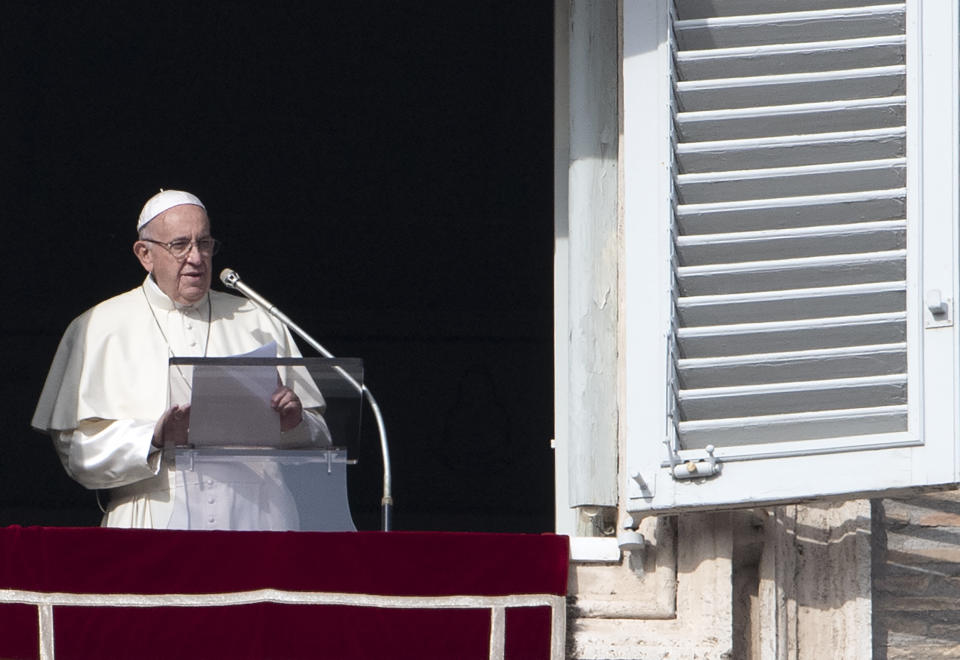 Pope Francis addresses the crowd from the window of the apostolic palace overlooking Saint Peter&rsquo;s square during his Sunday Angelus prayer on Dec. 2. (Photo: TIZIANA FABI via Getty Images)