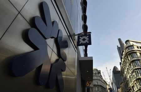A branch of the Royal Bank of Scotland is seen in the City of London December 16, 2014. REUTERS/Toby Melville