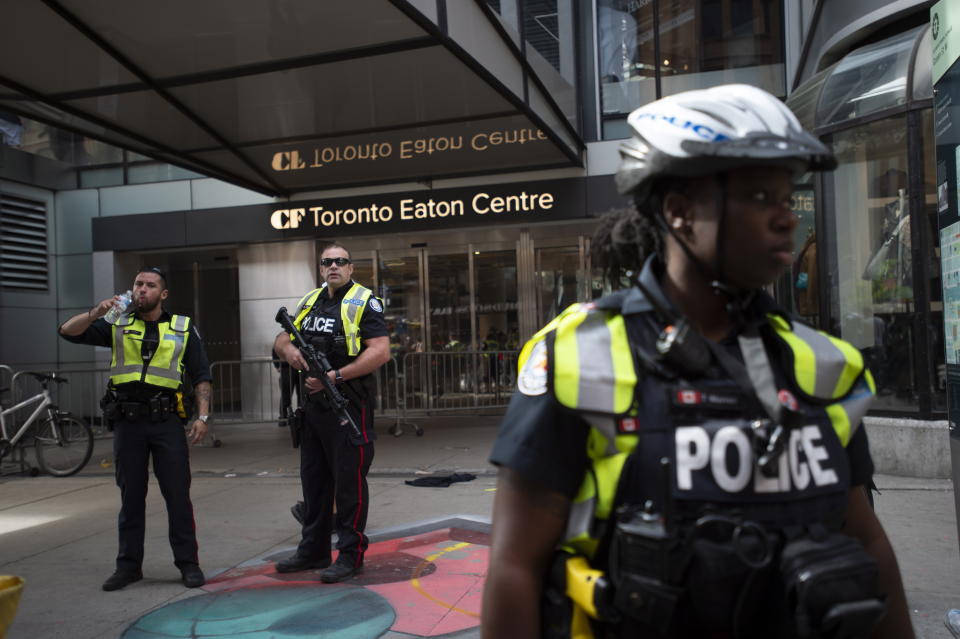Toronto Police secure the scene where shots were fired during the Toronto Raptors NBA basketball championship parade in Toronto, Monday, June 17, 2019. (Andrew Lahodynskyj/The Canadian Press via AP)