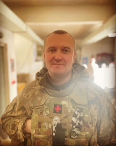 PHOTO: Medic Vitaliy Stasyuk helps injured soldiers at a military field hospital in Ukraine's eastern Donbas. (Tom Burridge/ABC News)