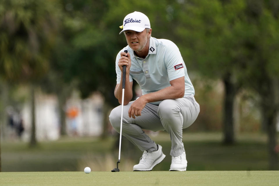 Matt Jones looks at his shot on the third hole during the final round of the Honda Classic golf tournament, Sunday, March 21, 2021, in Palm Beach Gardens, Fla. (AP Photo/Marta Lavandier)