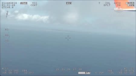 AMSA's (Australia Maritime Safety Authority) Challenger aircraft is in the air, supporting the international search effort for survivors from Kiribati ferry Butiraoi, near Kiribati, Central Pacific, January 31, 2018 in this still image taken from a video obtained on social media. AUSTRALIA MARITIME SAFETY AUTHORITY/ via REUTERS