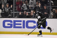 Fans celebrate Los Angeles Kings right wing Adrian Kempe's goal against the New York Islanders during the second period of an NHL hockey game in Los Angeles, Monday, March 11, 2024. (AP Photo/Alex Gallardo)
