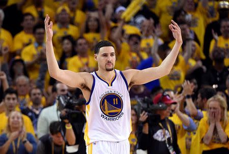 Golden State Warriors guard Klay Thompson (11) reacts after the game against the Cleveland Cavaliers in game one of the NBA Finals at Oracle Arena. Mandatory Credit: Kyle Terada-USA TODAY Sports